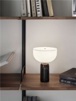 Billede af New Works Kizu Portable Table Lamp Ø: 18 cm - Black Marble / White Acrylic