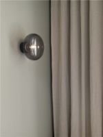 Billede af New Works Karl-Johan Wall Lamp - Black stained oak/Smoked Glass